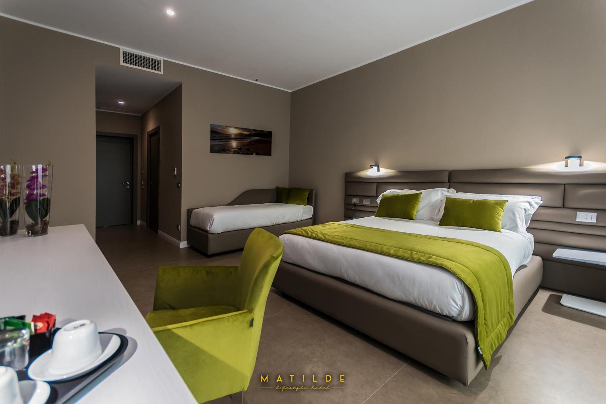 Deluxe Triple Room