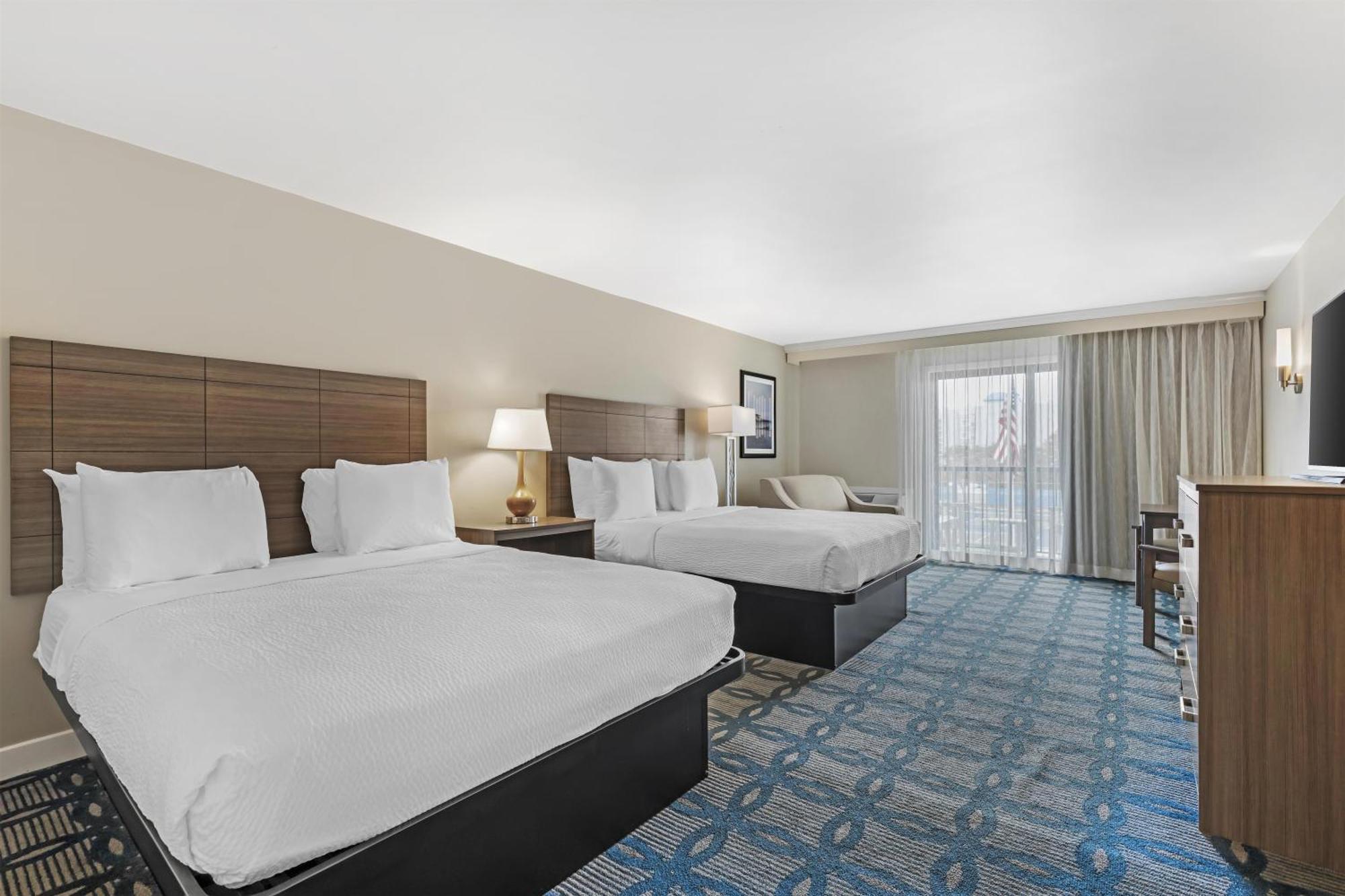 Queen Room with Two Queen Beds, Chair Bed, Balcony and Shower - Non-Smoking