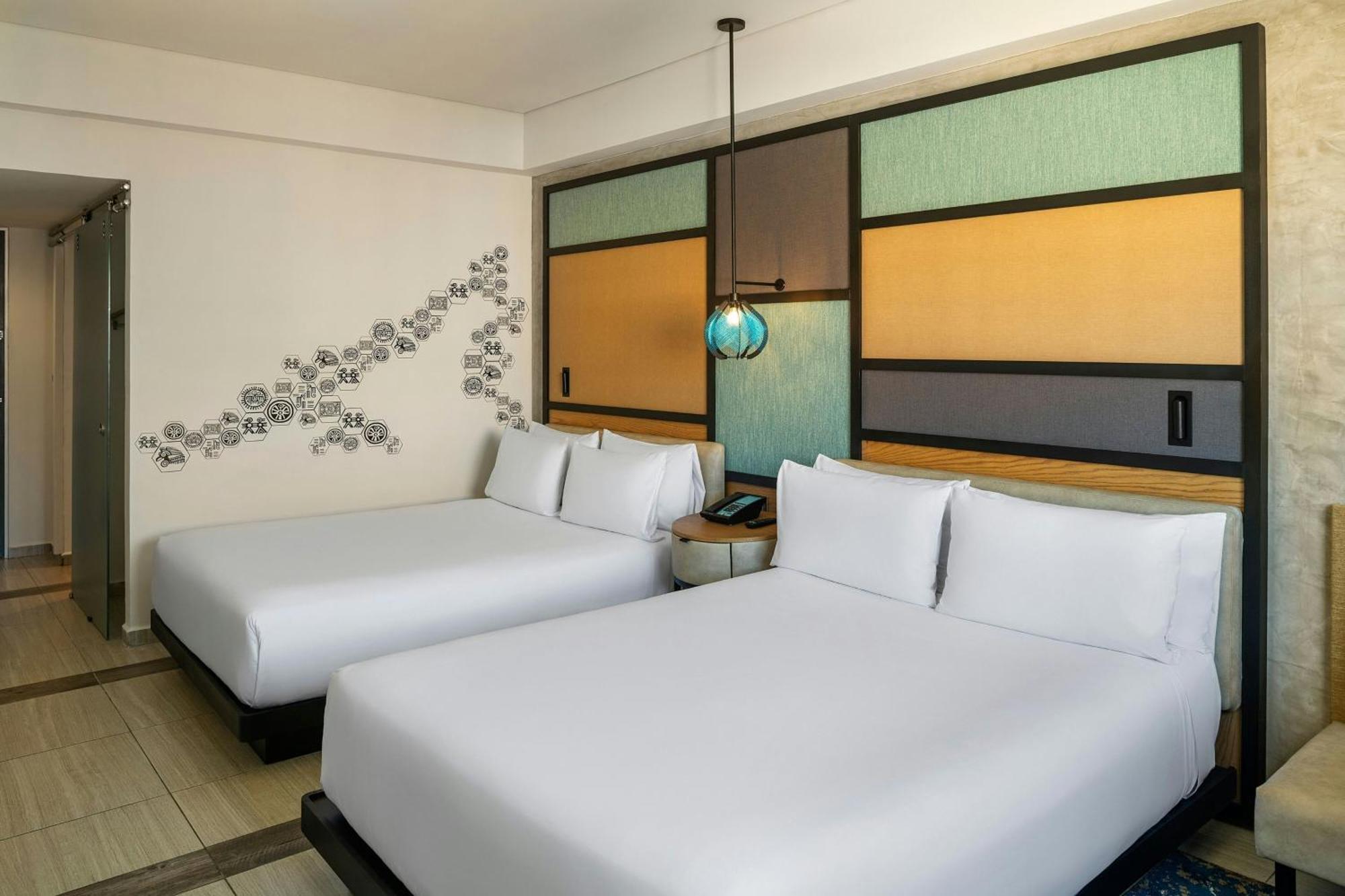 Aloft Ocean View Guest room 2 Queen Complimentary open bar