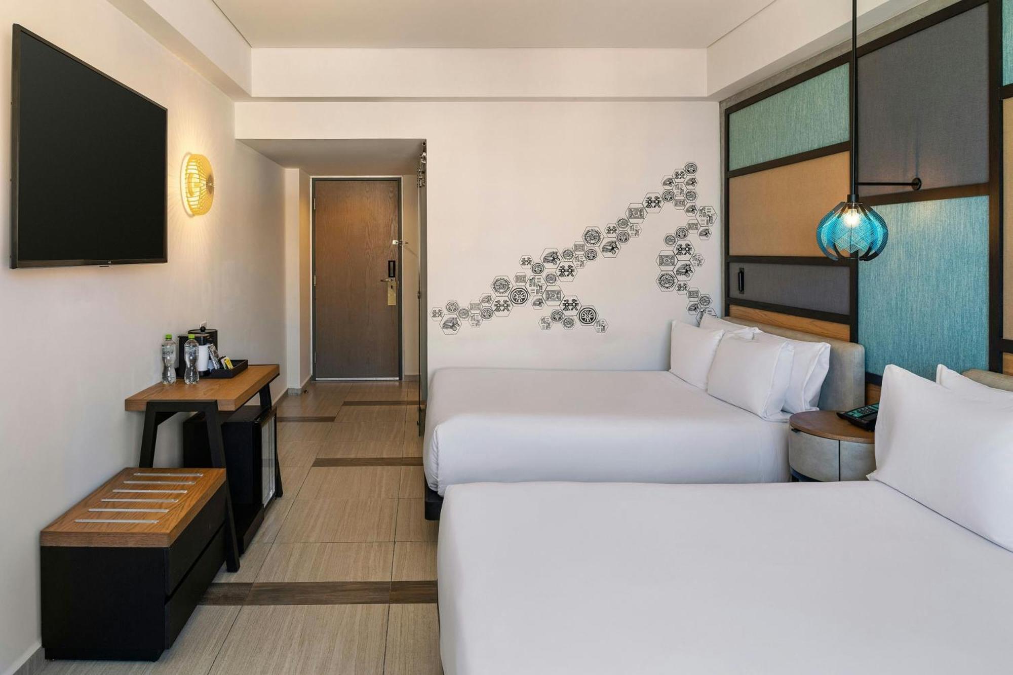 Aloft Ocean View Guest room 2 Queen Complimentary open bar